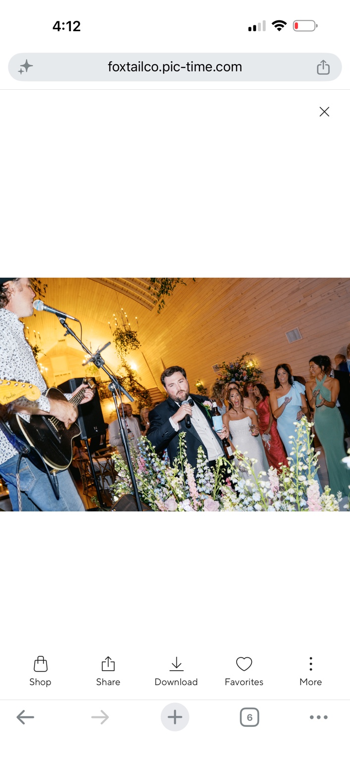 A wedding guest joining in on the microphone